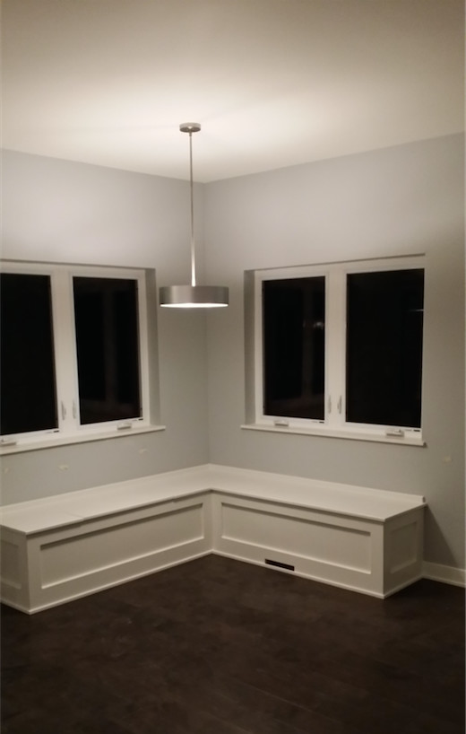 Inspiration for a mid-sized transitional enclosed dark wood floor and brown floor living room remodel with blue walls, no fireplace and no tv