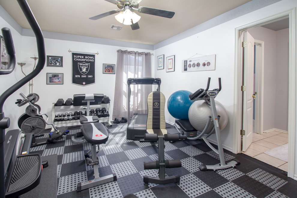 Mid-sized transitional home weight room in Oklahoma City with beige walls and black floor.