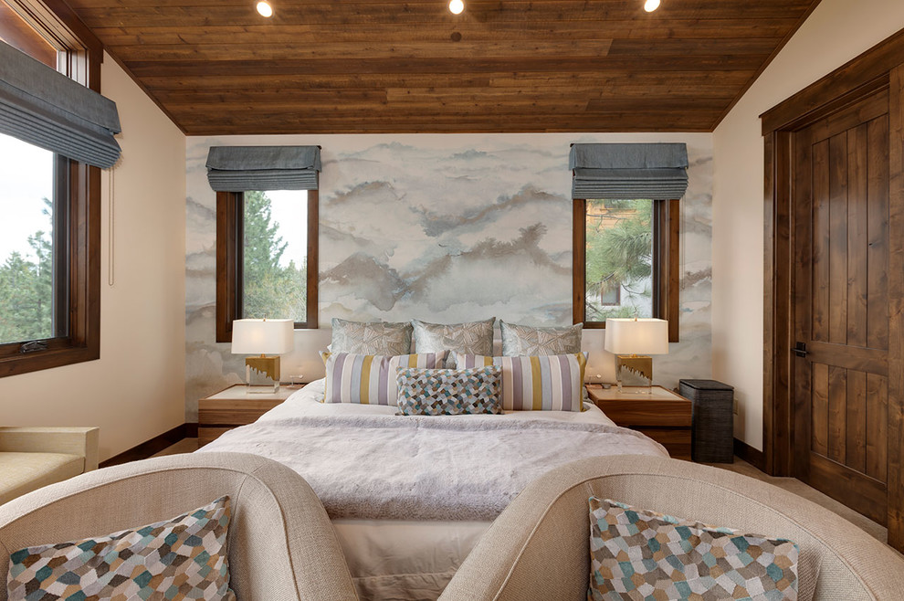 Inspiration for a mid-sized rustic master carpeted and brown floor bedroom remodel with beige walls, a corner fireplace and a wood fireplace surround