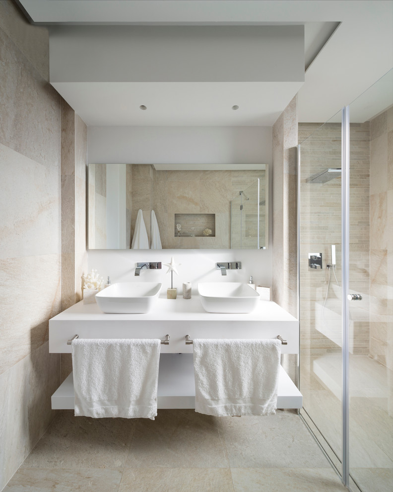 Photo of a mid-sized contemporary bathroom in Other with a curbless shower and a vessel sink.