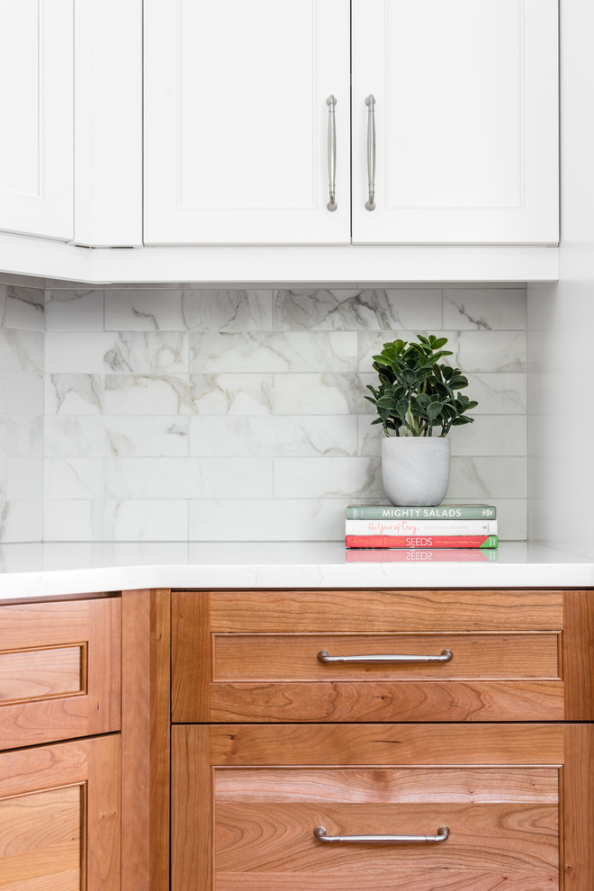 Example of a mid-sized transitional home design design