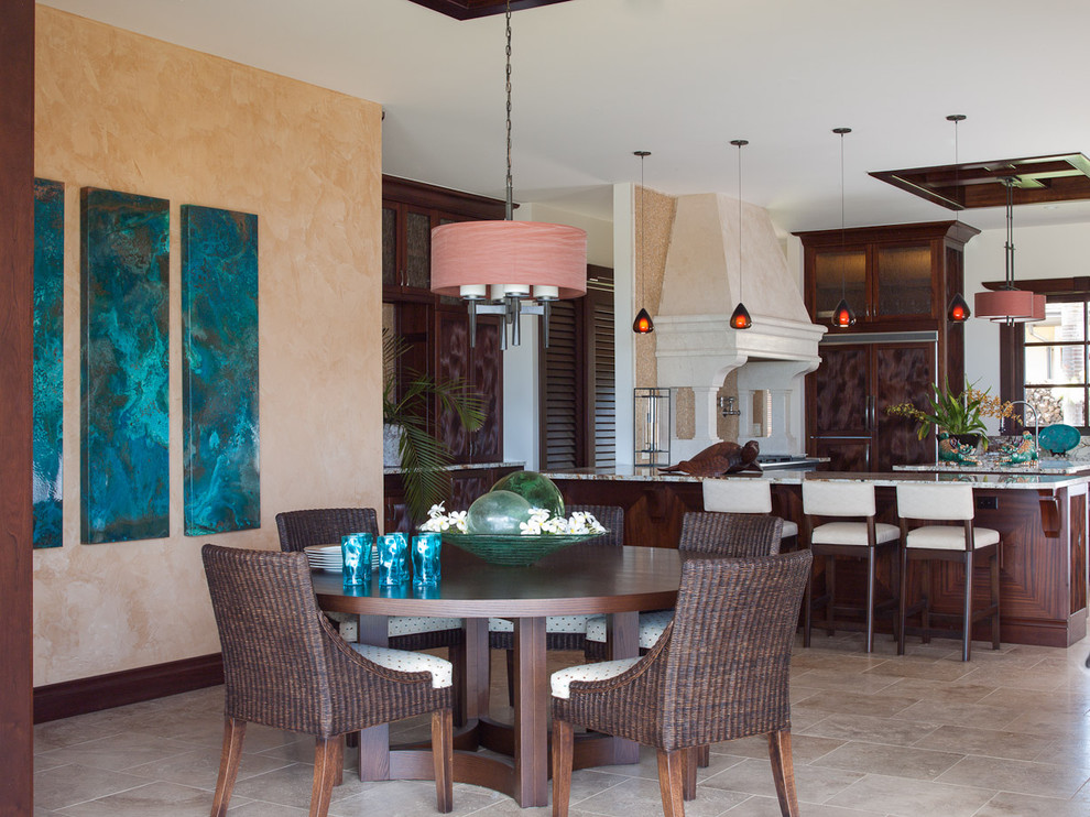 Mid-sized tropical open plan dining in Hawaii with beige walls and porcelain floors.