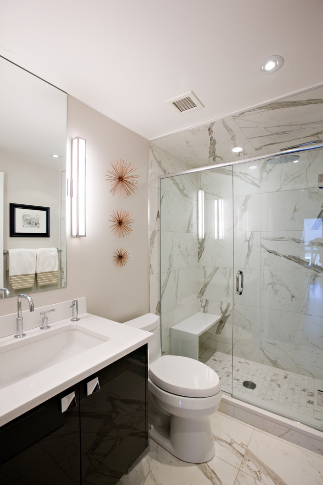 Inspiration for a small contemporary master bathroom in Other with flat-panel cabinets, dark wood cabinets, an alcove shower, a two-piece toilet, white walls, porcelain floors, an undermount sink, engineered quartz benchtops, gray tile, travertine and beige floor.