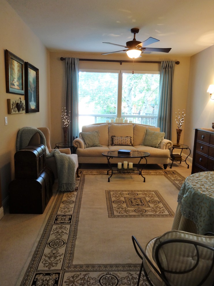 This is an example of a small traditional enclosed living room in Sacramento with a concealed tv.