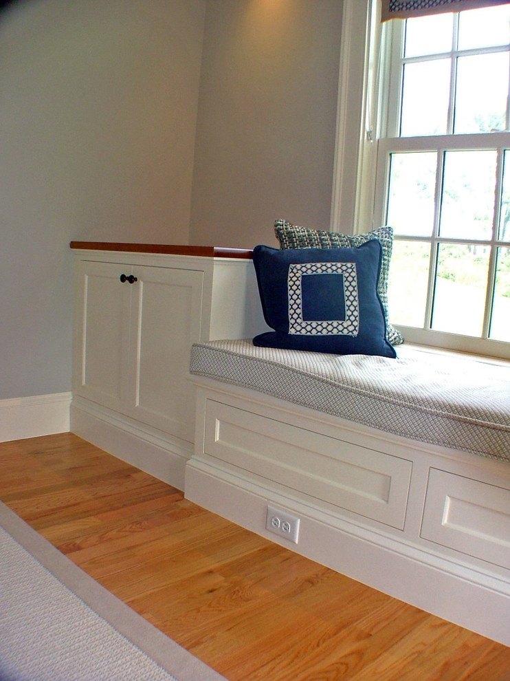 Photo of a mid-sized traditional bedroom in Portland Maine.