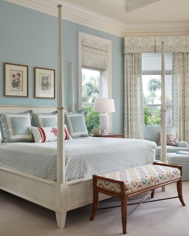 Inspiration for a mid-sized transitional master bedroom in Miami with blue walls, carpet, no fireplace and beige floor.