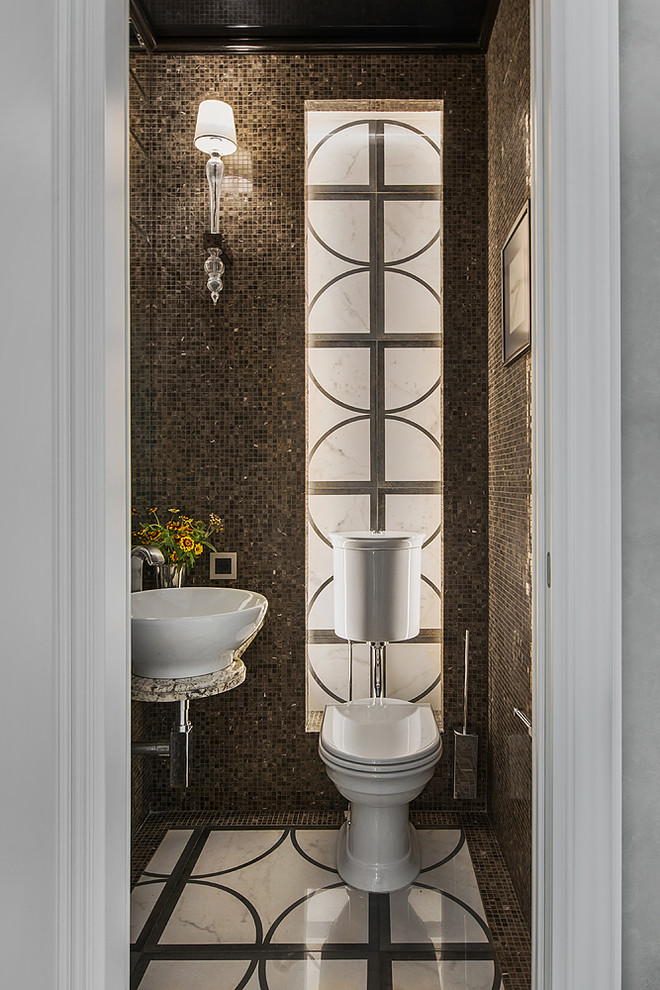 Transitional powder room in Moscow with a two-piece toilet, brown tile, mosaic tile and a vessel sink.