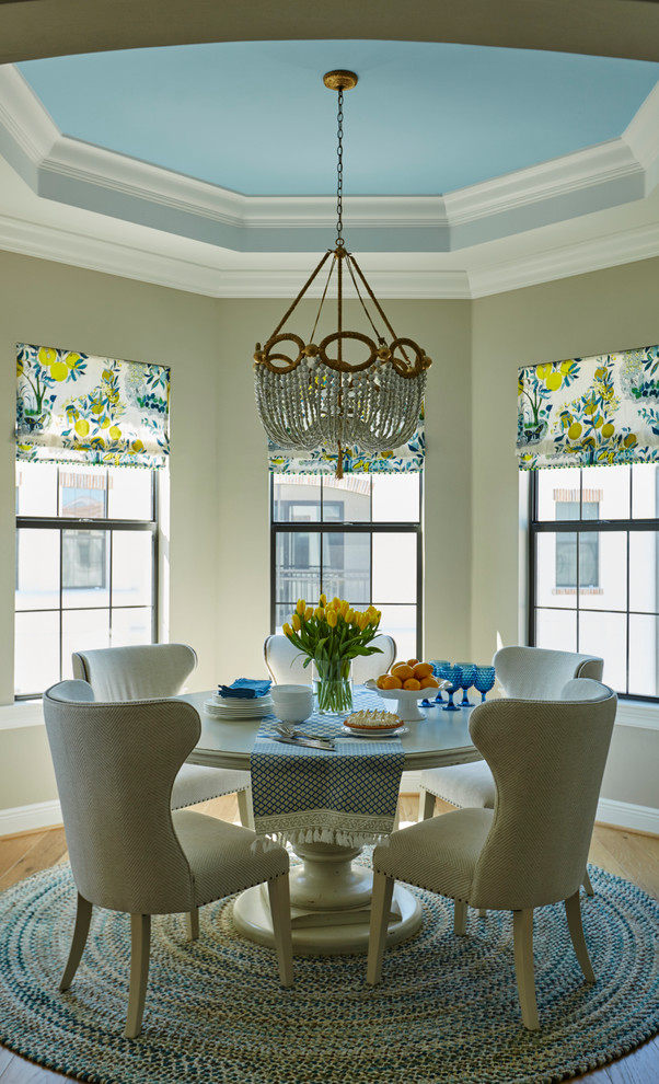 Inspiration for a mid-sized transitional kitchen/dining room combo remodel in Miami with beige walls
