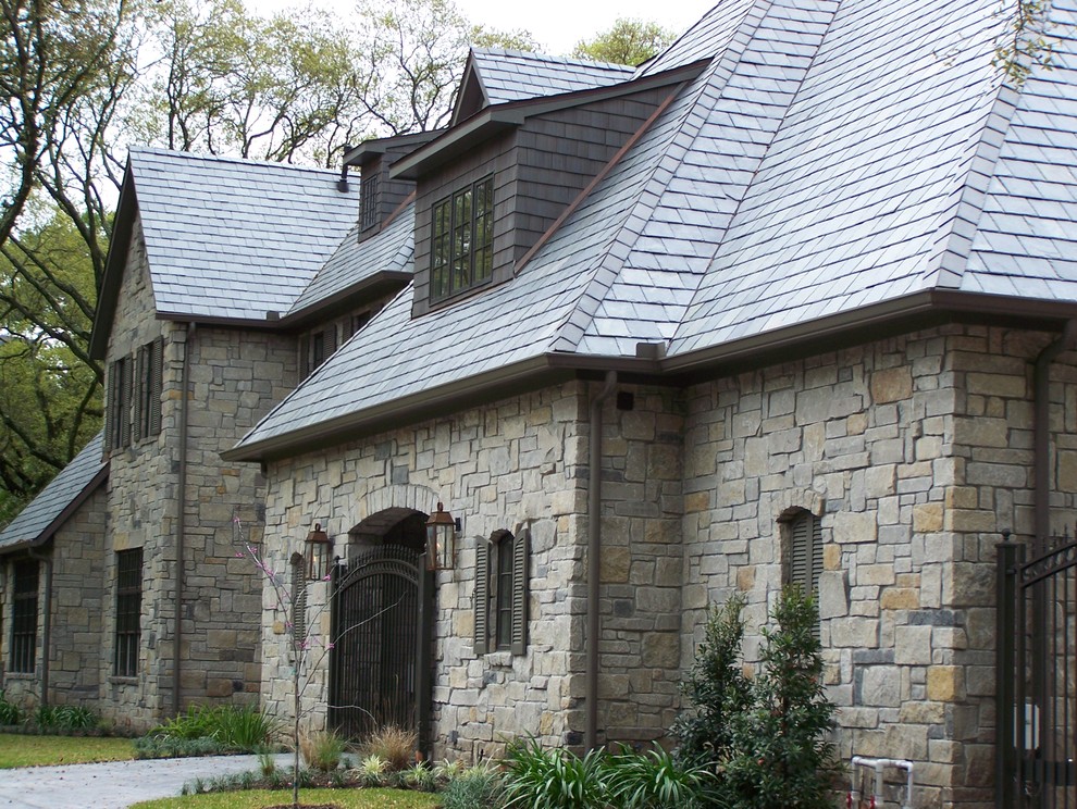 This is an example of a traditional exterior in Houston with stone veneer.