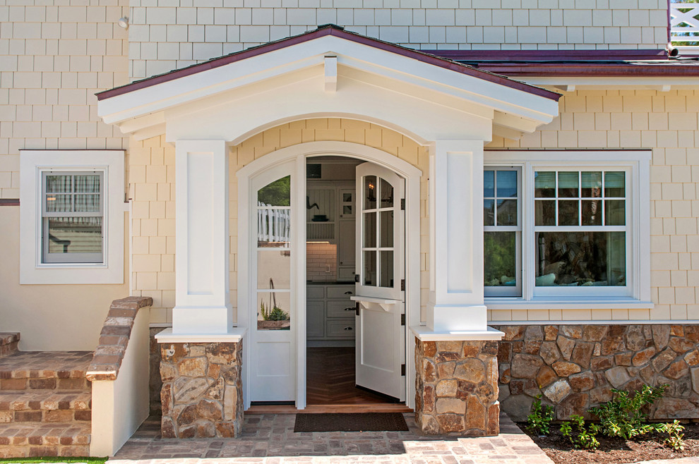 Photo of a large traditional front door in San Diego with a dutch front door and a white front door.