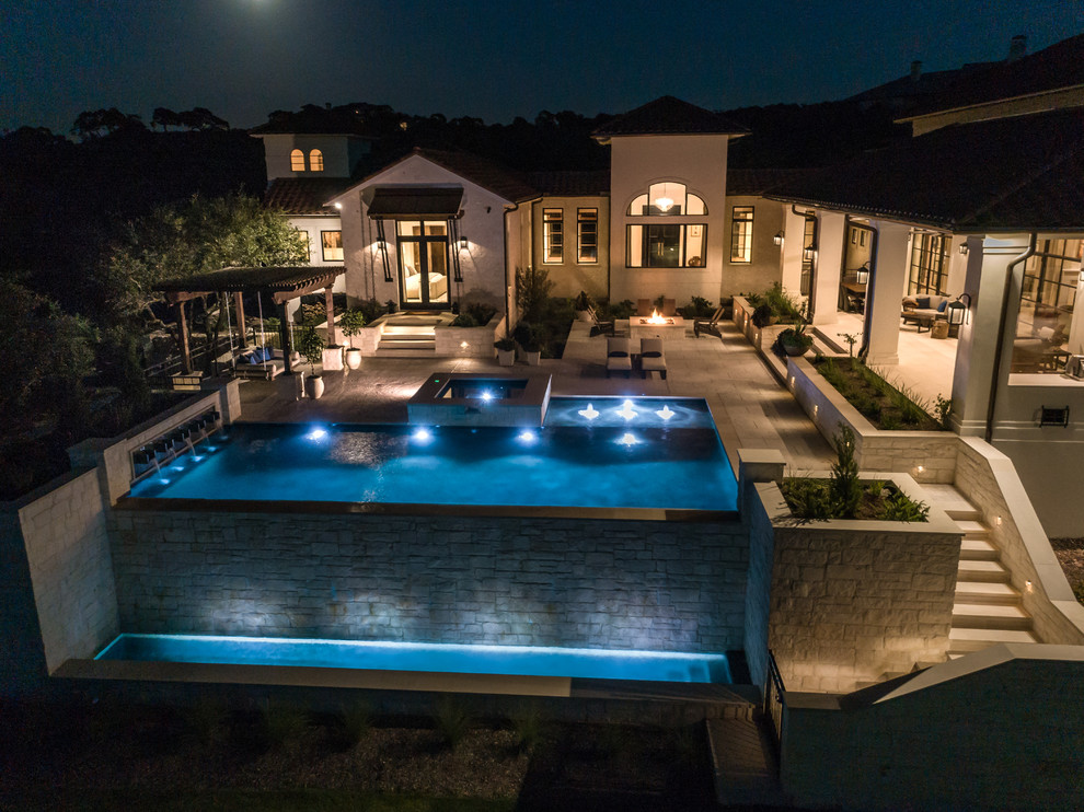 Example of a transitional home design design in Austin