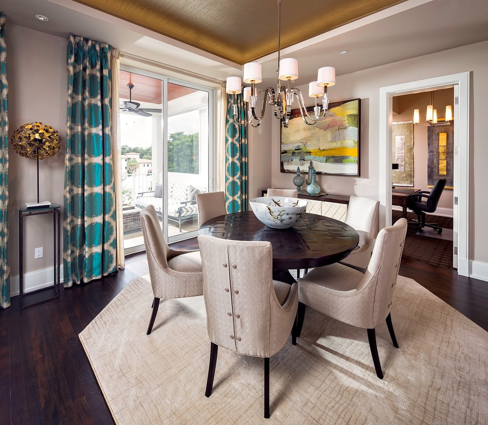 Design ideas for a transitional dining room in Miami with grey walls and medium hardwood floors.