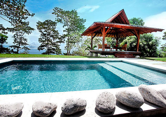 Inspiration for a small asian rectangular pool in Other with concrete slab.