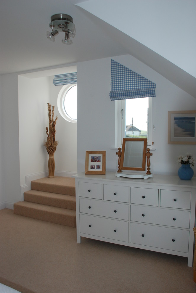 This is an example of a beach style bedroom in Cornwall.