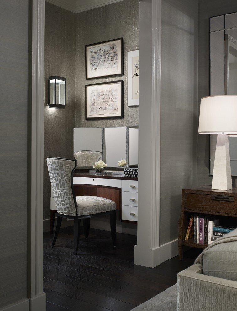 Transitional bedroom in Chicago with grey walls and dark hardwood floors.
