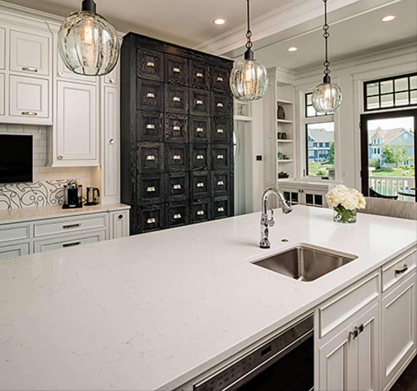 Inspiration for a large transitional galley dark wood floor and brown floor open concept kitchen remodel with a double-bowl sink, recessed-panel cabinets, white cabinets, white backsplash, stainless steel appliances and two islands
