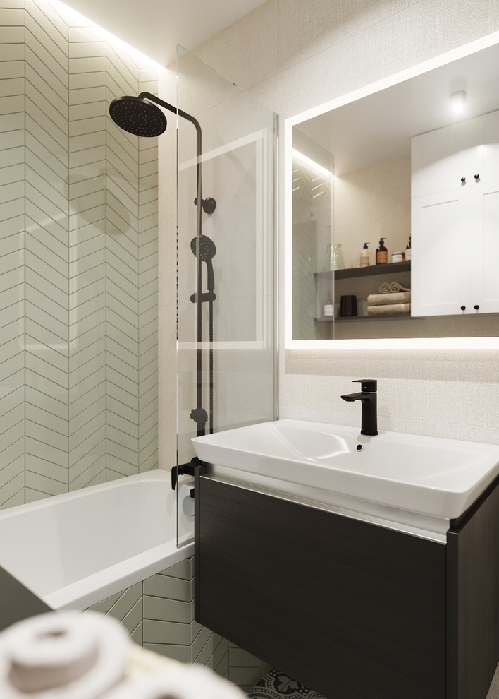 Удобная подвесная тумбочка чёрного цвета и фигурная плитка Шеврон создают визуал