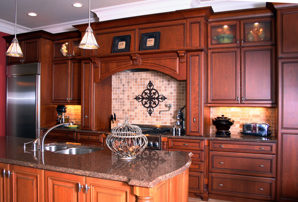Large transitional single-wall ceramic tile eat-in kitchen photo in Raleigh with a double-bowl sink, recessed-panel cabinets, dark wood cabinets, granite countertops, beige backsplash, mosaic tile backsplash, stainless steel appliances, an island and brown countertops