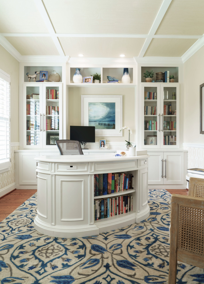 Design ideas for a beach style home office in Baltimore with a freestanding desk, wallpaper, decorative wall panelling, beige walls, medium hardwood floors and brown floor.
