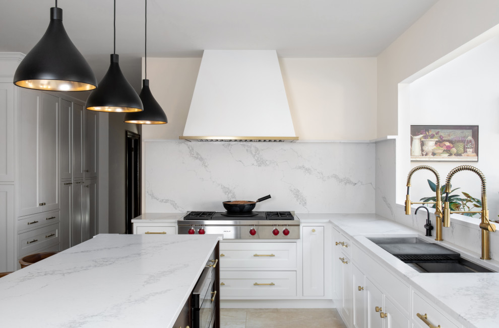 Inspiration for a large transitional u-shaped separate kitchen in Newark with an undermount sink, beaded inset cabinets, white cabinets, quartz benchtops, white splashback, engineered quartz splashback, panelled appliances, travertine floors, with island, beige floor and white benchtop.
