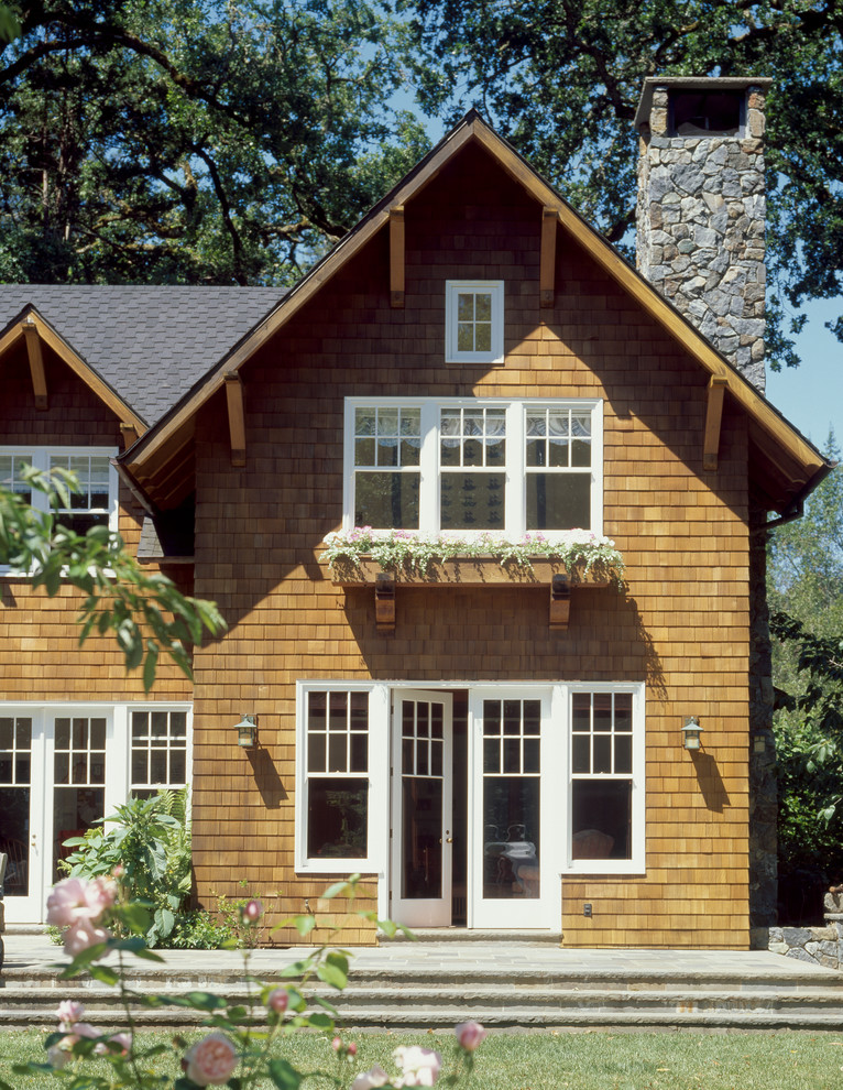 Photo of a traditional two-storey exterior in San Francisco with wood siding.