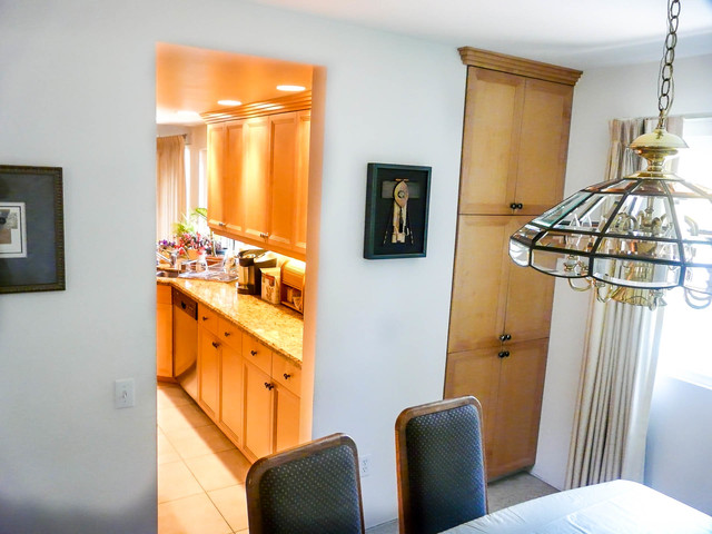 Angled Wall Transforms Corridor Kitchen transitional-kitchen