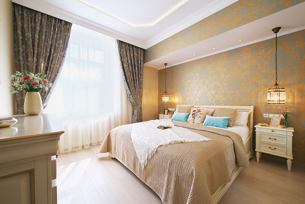 Design ideas for a small transitional master bedroom in Moscow with beige walls and light hardwood floors.