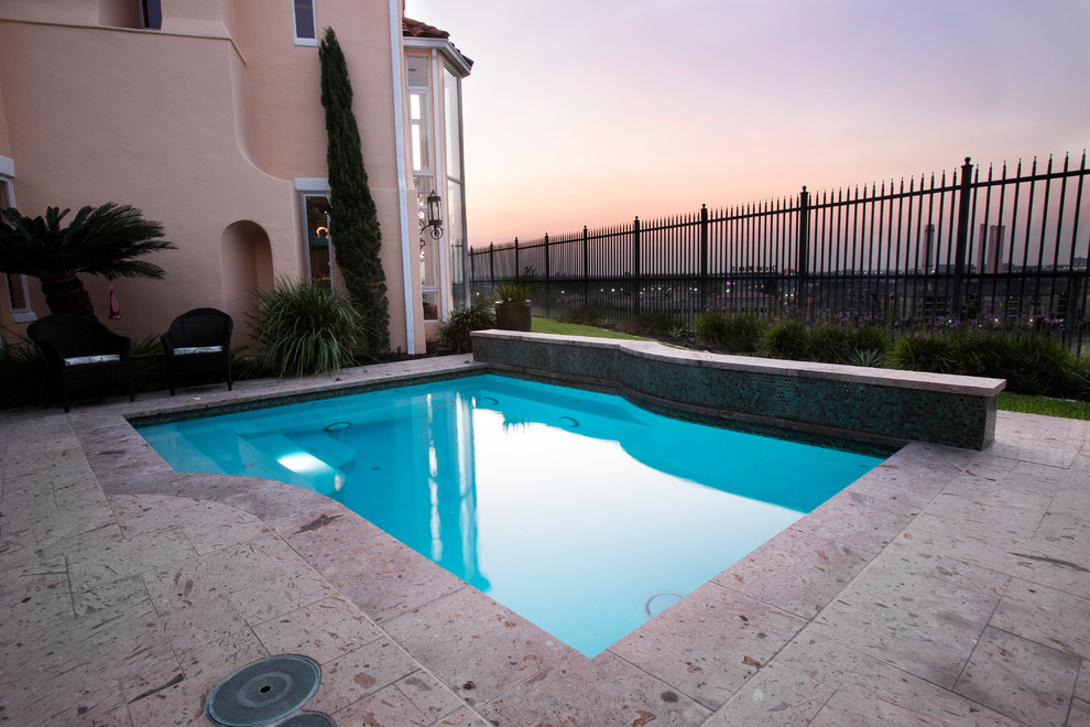 Inspiration for a transitional pool remodel in Austin