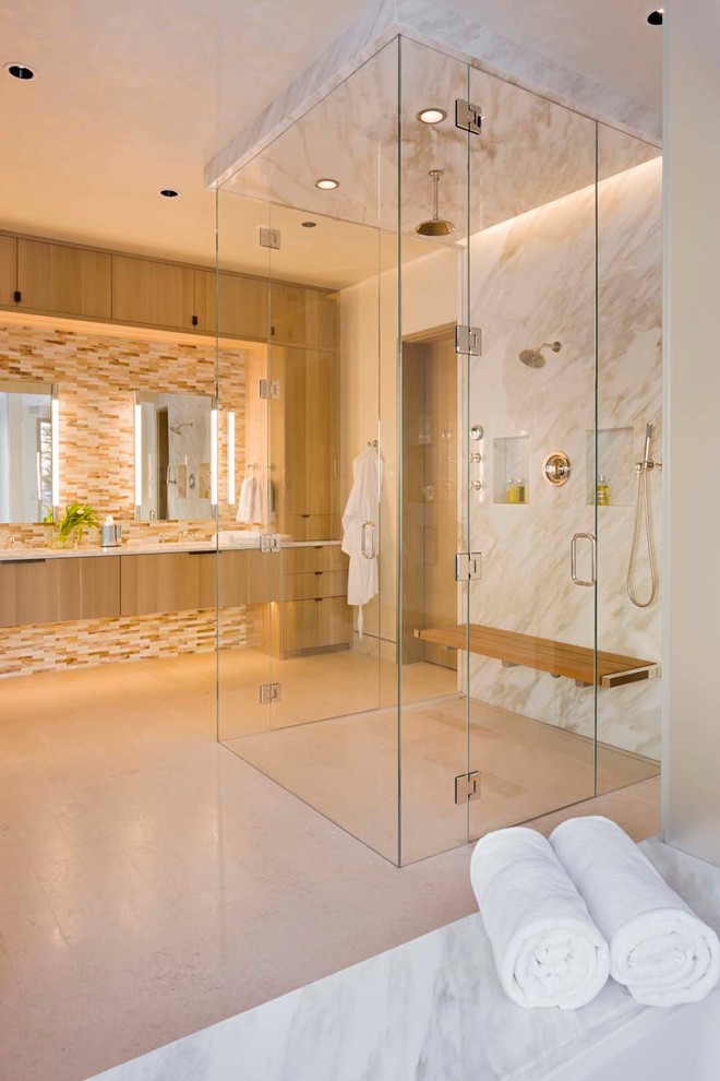 Inspiration for a large country master bathroom in Denver with flat-panel cabinets, beige tile, light wood cabinets, an open shower, glass tile, white walls, quartzite benchtops, beige floor, an open shower, a niche and a shower seat.