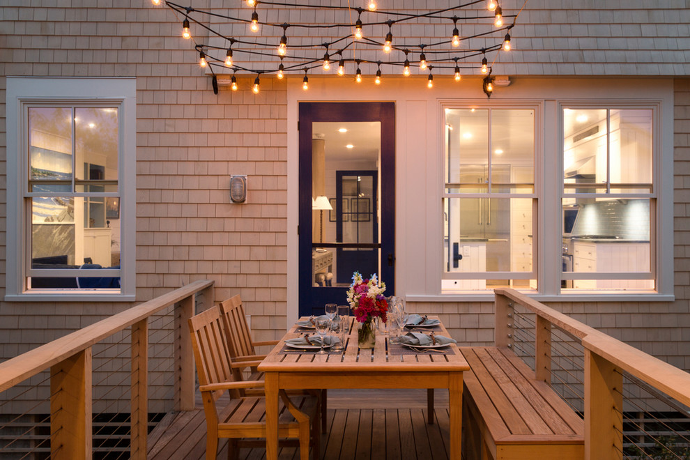 This is an example of a beach style deck in Portland Maine with no cover.