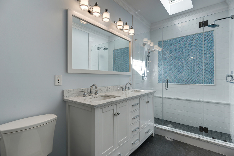 Mid-sized contemporary master bathroom in DC Metro with beaded inset cabinets, white cabinets, a freestanding tub, a double shower, a two-piece toilet, black and white tile, ceramic tile, blue walls, porcelain floors, an undermount sink and marble benchtops.