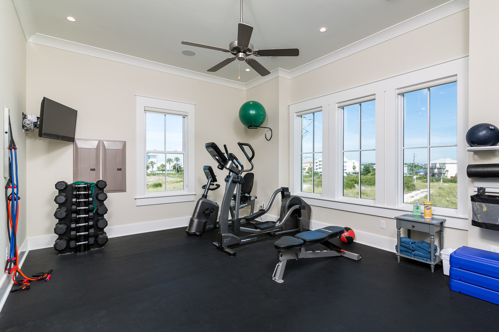 Inspiration for a large beach style multipurpose gym in Birmingham with beige walls.