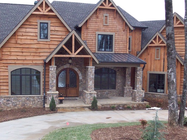 Mountain home with rustic wood siding Rustic Exterior Mountain home with rustic wood siding Rustic Exterior