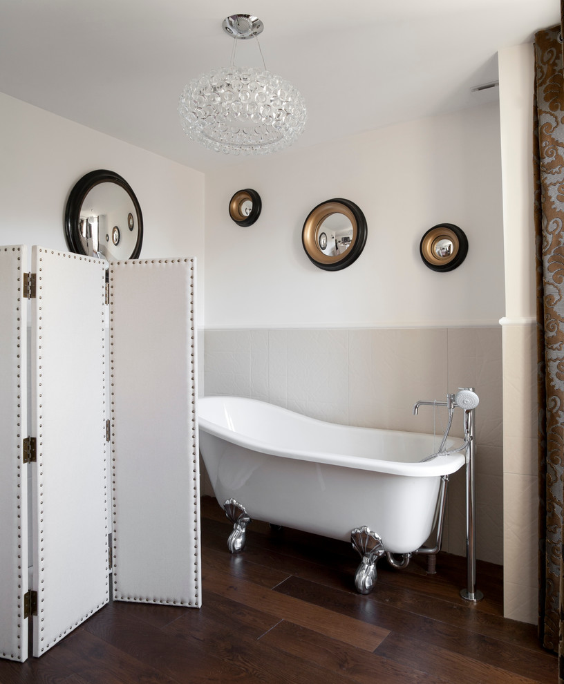 Design ideas for a contemporary master bathroom in Paris with a claw-foot tub.