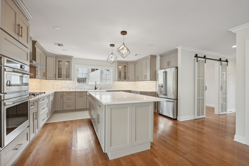 Greige Kitchen with Island and Glass Barn Doors