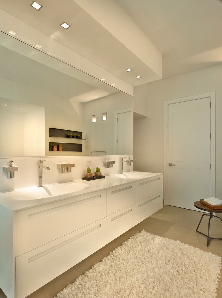 Inspiration for a large contemporary master bathroom in Miami with flat-panel cabinets, white cabinets, white walls and an undermount sink.