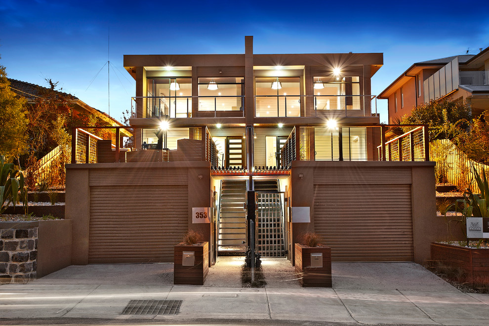 Photo of a contemporary duplex exterior in Melbourne.