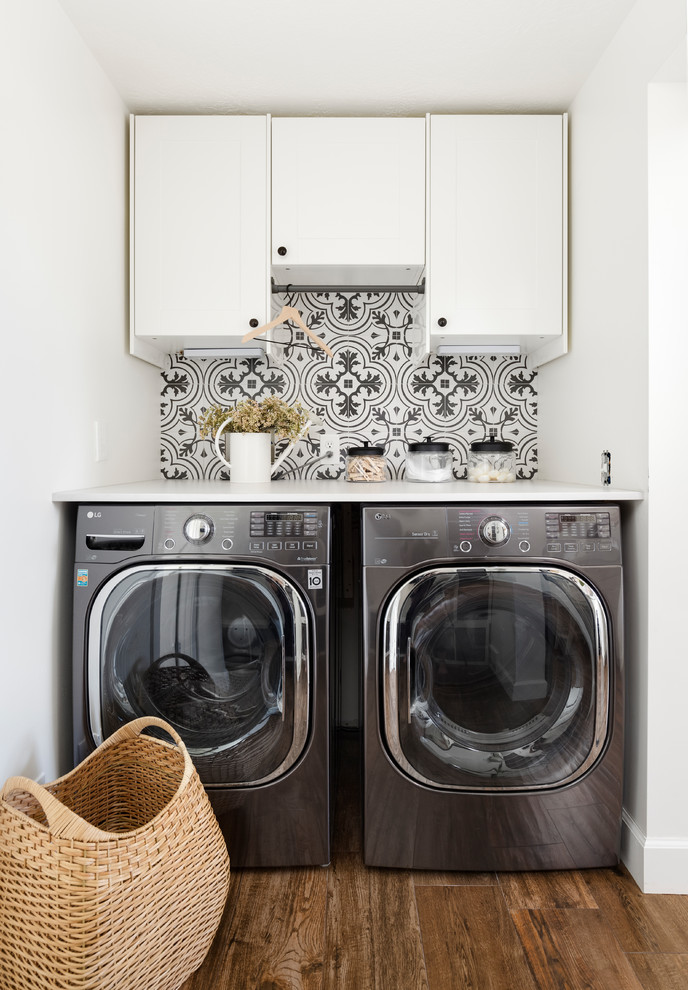 Design ideas for a small country single-wall dedicated laundry room in Salt Lake City with shaker cabinets, white cabinets, quartz benchtops, white walls, a side-by-side washer and dryer and white benchtop.