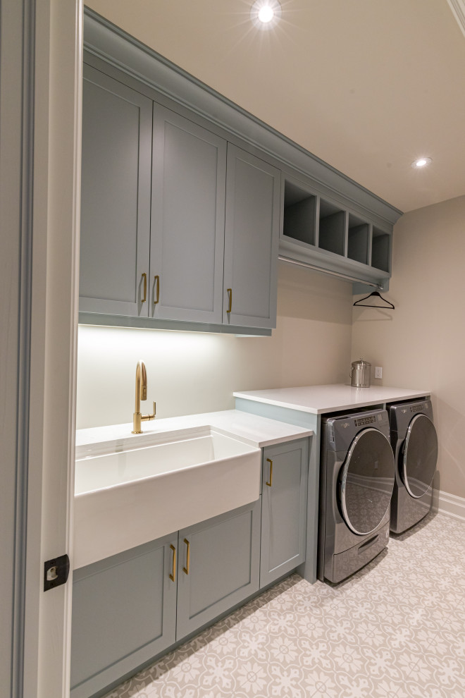 Small classic single-wall separated utility room in Toronto with engineered stone countertops and white worktops.