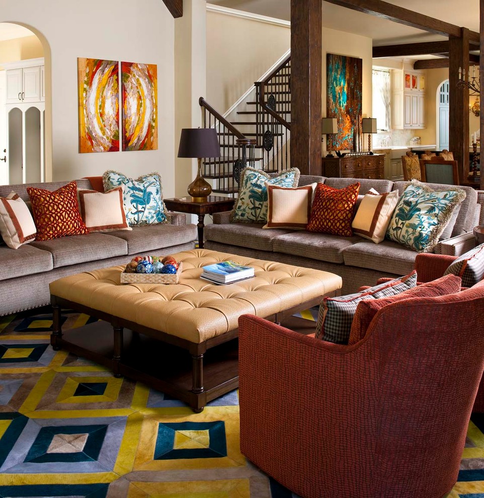 This is an example of a mediterranean open concept family room in Dallas with beige walls.