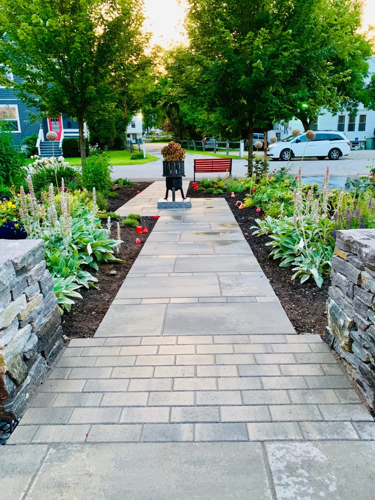 Inspiration for a contemporary front yard garden in Portland Maine with with path and concrete pavers.