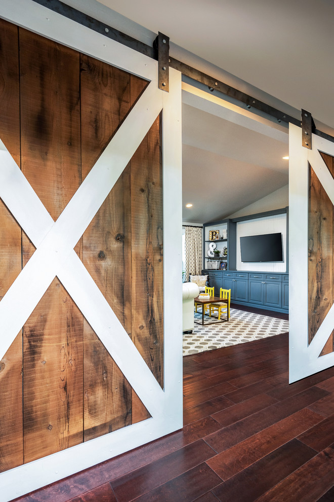 Inspiration for a large transitional dark wood floor and brown floor hallway remodel in Phoenix with gray walls