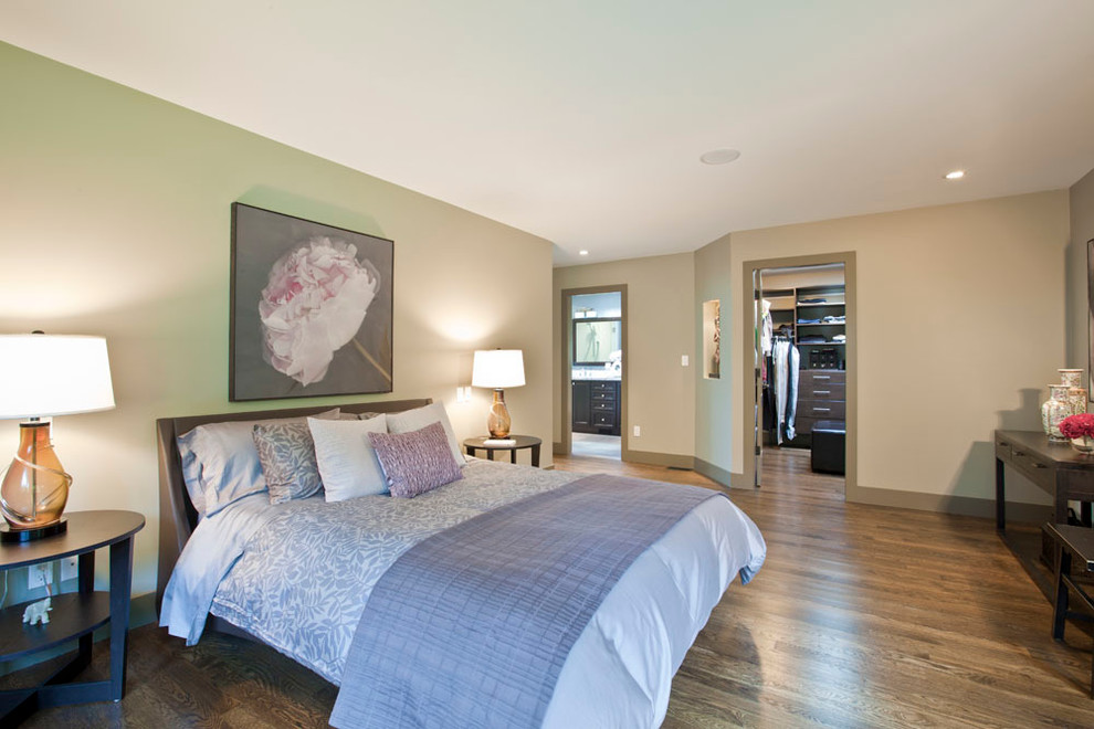 Photo of a large contemporary master bedroom in Vancouver with green walls and no fireplace.