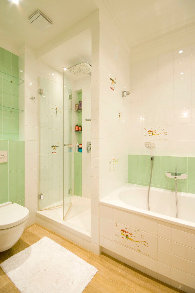 Small contemporary master bathroom in Moscow with an alcove tub, an alcove shower, a wall-mount toilet, beige tile, white tile, green tile and white walls.