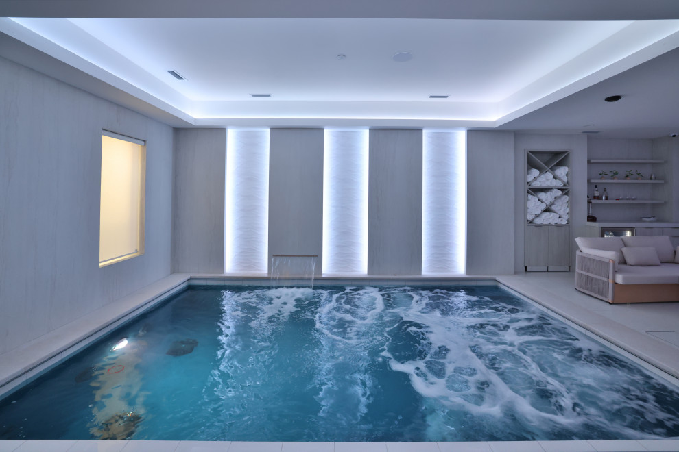 Hot tub - small indoor rectangular hot tub idea in Chicago