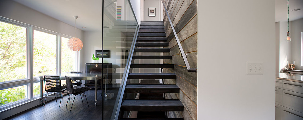 Photo of a contemporary straight staircase in Minneapolis.