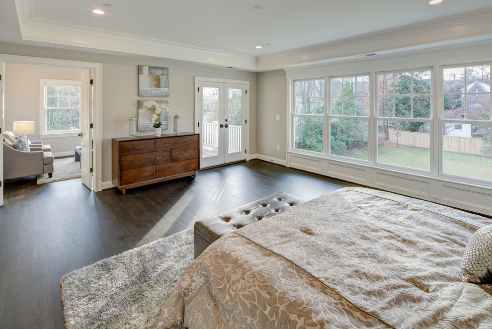 Inspiration for a large transitional master bedroom in DC Metro with grey walls, dark hardwood floors, no fireplace and brown floor.
