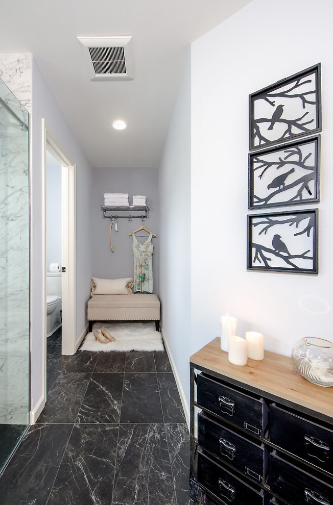 Photo of a large contemporary master wet room bathroom in Seattle with recessed-panel cabinets, dark wood cabinets, an alcove tub, grey walls, marble floors, an undermount sink, engineered quartz benchtops, black floor, a sliding shower screen and white benchtops.