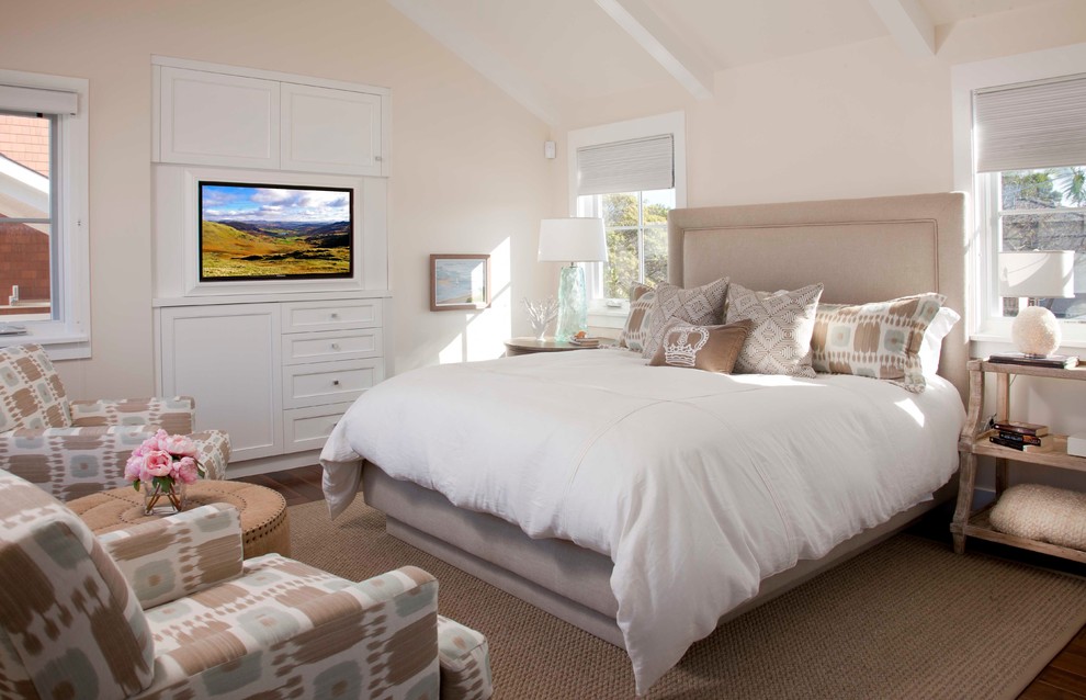 Inspiration for a contemporary bedroom in San Diego with beige walls, dark hardwood floors and no fireplace.