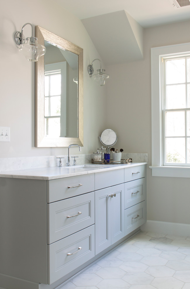 Mid-sized transitional master white tile and stone tile porcelain tile bathroom photo in Newark with gray cabinets, beige walls, an undermount sink, marble countertops and recessed-panel cabinets